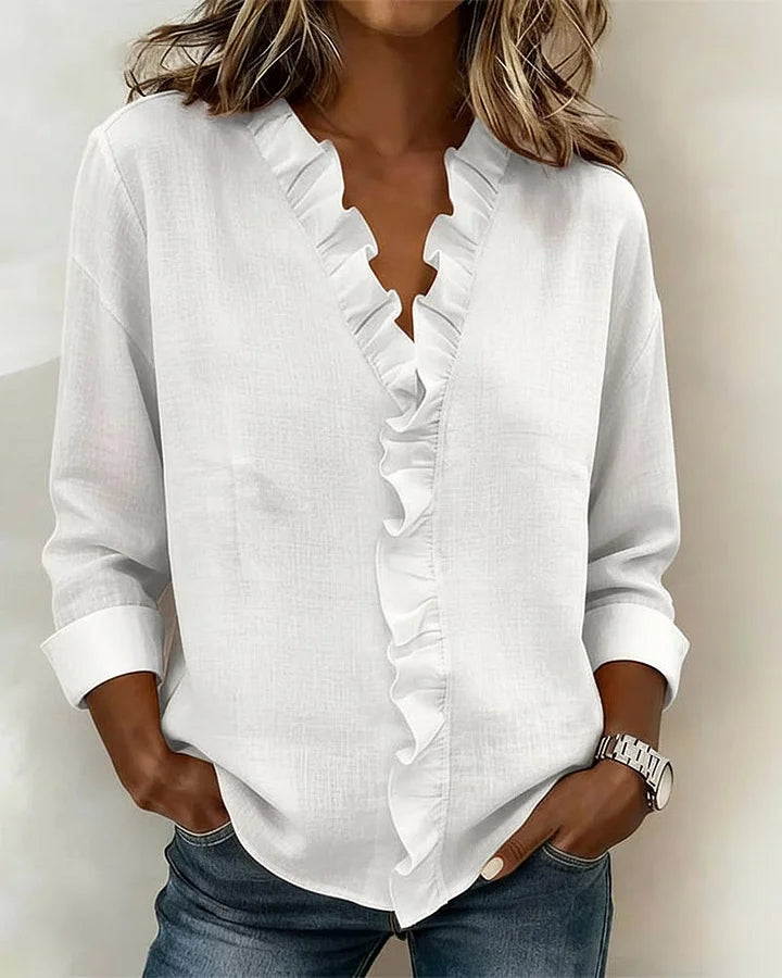 Chiara™ | Blusa con scollo a V e volant delicati