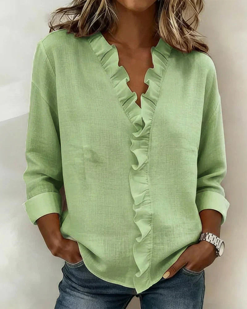 Chiara™ | Blusa con scollo a V e volant delicati