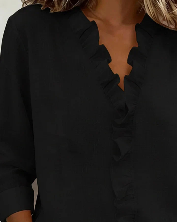Chiara™ | Blusa con scollo a V e volant delicati